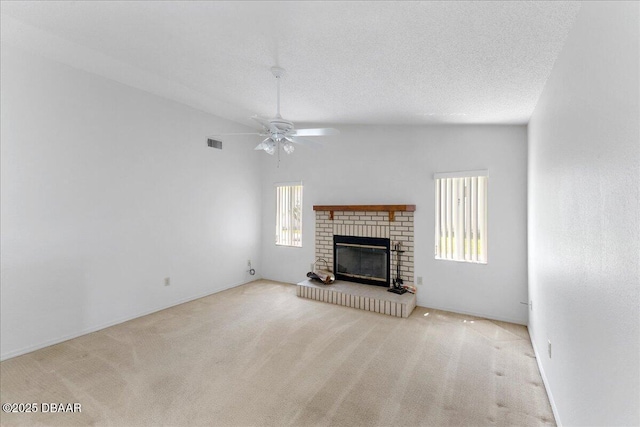 744 Hawks Ridge Rd, Port Orange, FL 32127 - unfurnished living room with carpet, a ceiling fan, and a brick fireplace