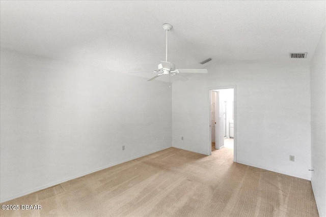 744 Hawks Ridge Rd, Port Orange, FL 32127 - empty room featuring ceiling fan, light carpet, and vaulted ceiling