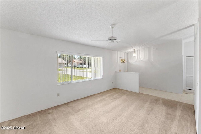 744 Hawks Ridge Rd, Port Orange, FL 32127 - carpeted empty room with a ceiling fan and a textured ceiling