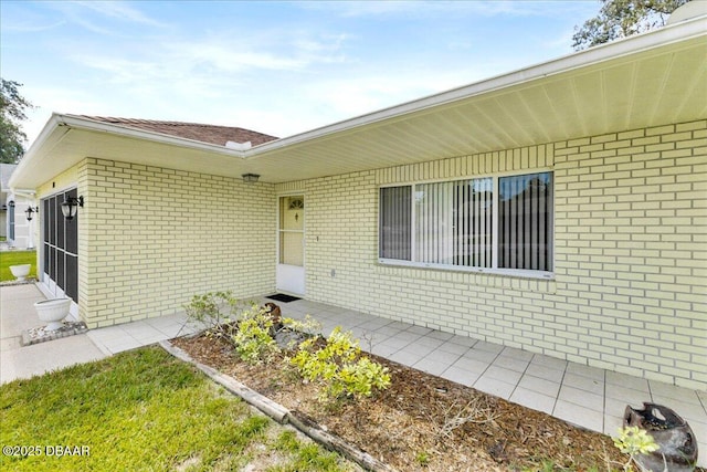 744 Hawks Ridge Rd, Port Orange, FL 32127 - entrance to property with brick siding and an attached garage