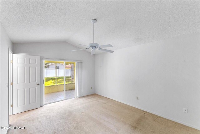 744 Hawks Ridge Rd, Port Orange, FL 32127 - carpeted empty room with a ceiling fan, lofted ceiling, and a textured ceiling