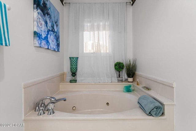 bathroom featuring a tub to relax in