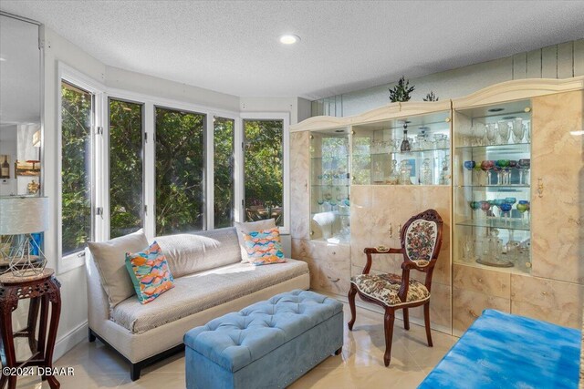 2934 Oceans Trce, Daytona Beach Shores, FL 32118 - sunroom / solarium with a textured ceiling
