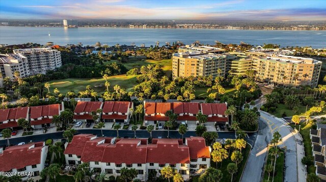 2934 Oceans Trce, Daytona Beach Shores, FL 32118 - aerial view of a golf course, a large body of water, and apartment complex