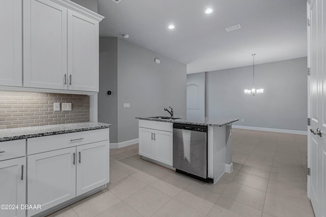 kitchen featuring dishwasher, white cabinetry, light stone counters, and a notable chandelier