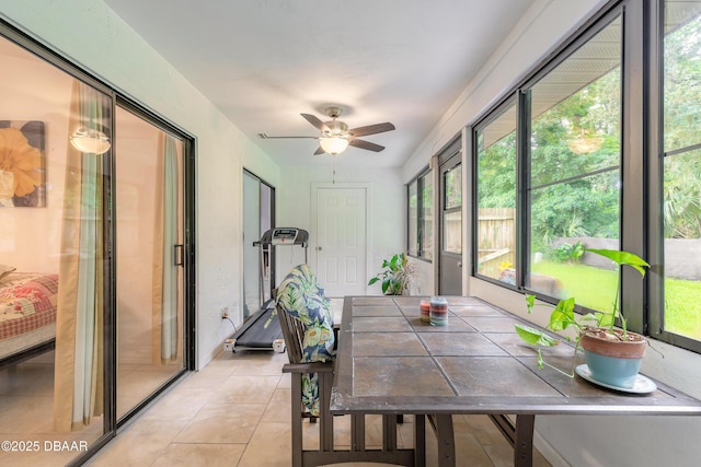 1237 Charter Oaks Cir, Holly Hill, FL 32117 - sunroom with ceiling fan, healthy amount of natural light, and outdoor dining area