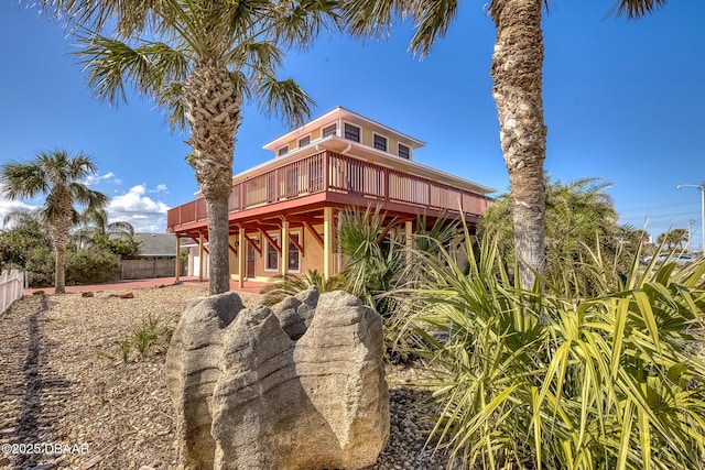 3726 S Atlantic Ave, New Smyrna Beach, FL 32169 - view of front of home with a deck