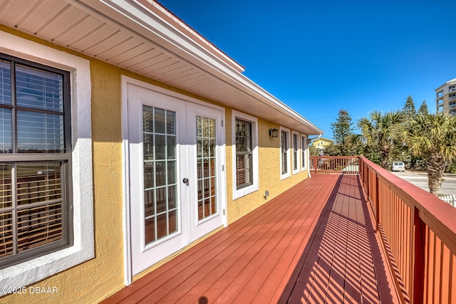 3726 S Atlantic Ave, New Smyrna Beach, FL 32169 - wooden deck featuring french doors