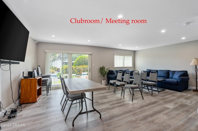 dining space with light wood-type flooring