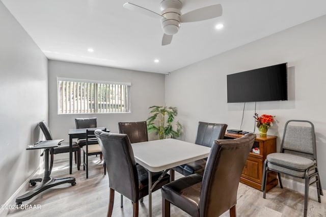 dining area featuring ceiling fan and light hardwood / wood-style floors