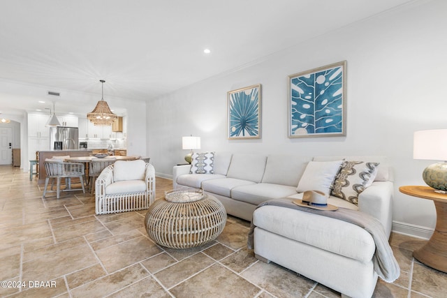 living room with an inviting chandelier