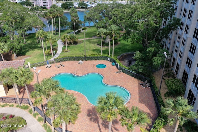 view of pool featuring a yard and a patio area