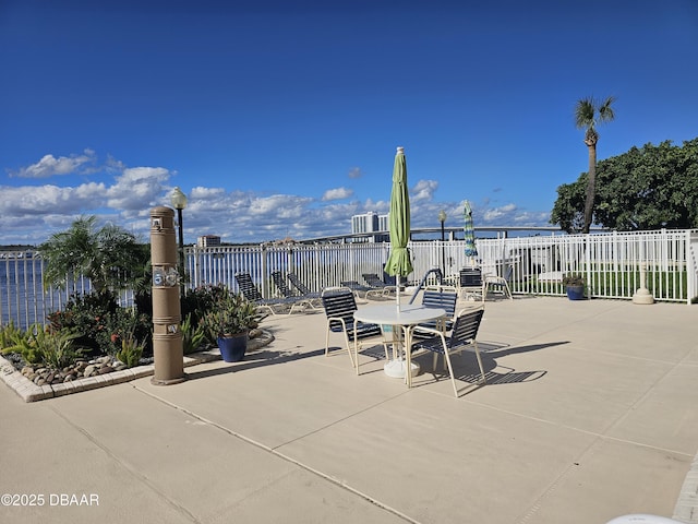 view of patio / terrace with a water view