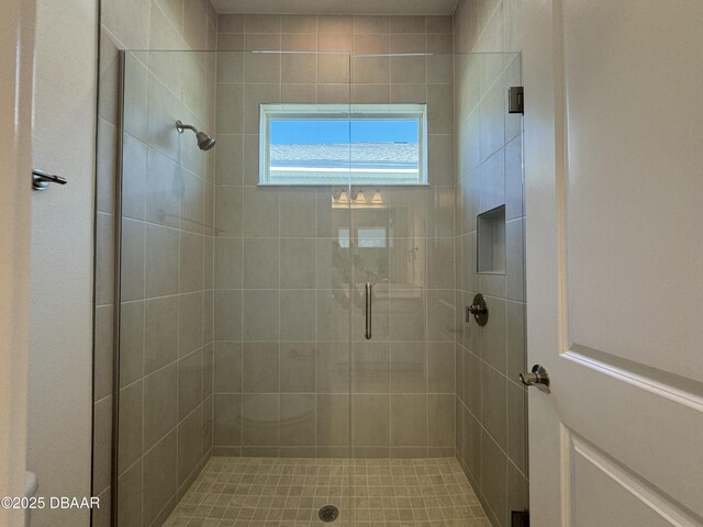 2009 Divot Dr, Daytona Beach, FL 32124 - bathroom featuring toilet and a shower stall