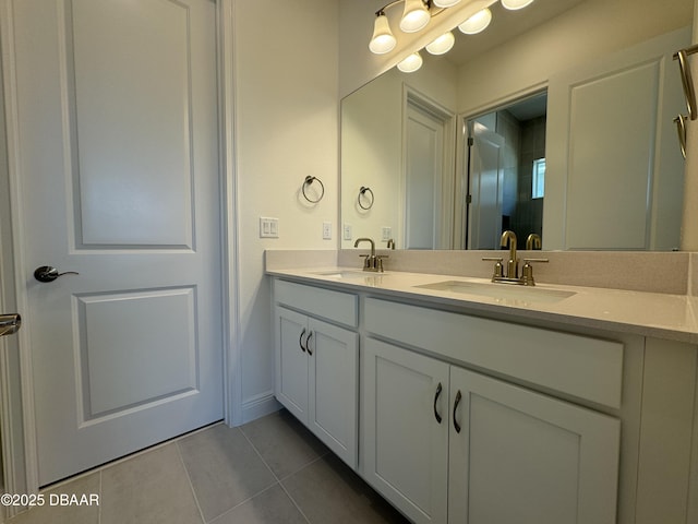 2009 Divot Dr, Daytona Beach, FL 32124 - full bathroom with tile patterned flooring, double vanity, and a sink