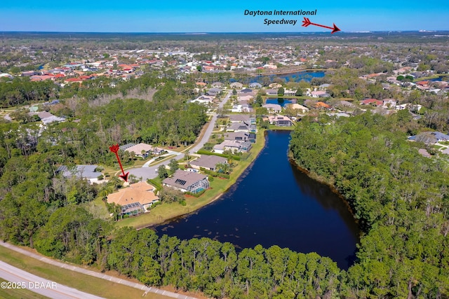 birds eye view of property featuring a residential view and a water view