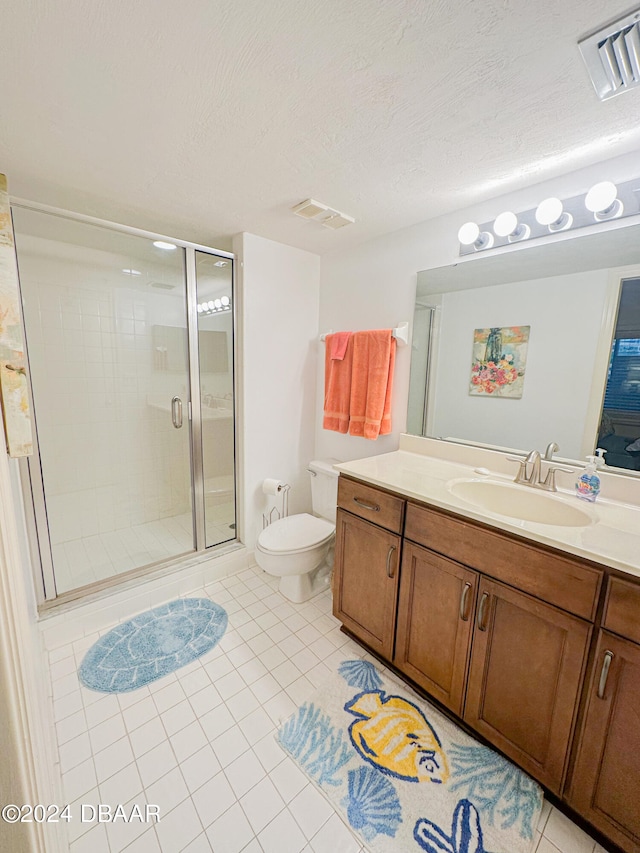 bathroom featuring walk in shower, tile patterned flooring, a textured ceiling, and toilet