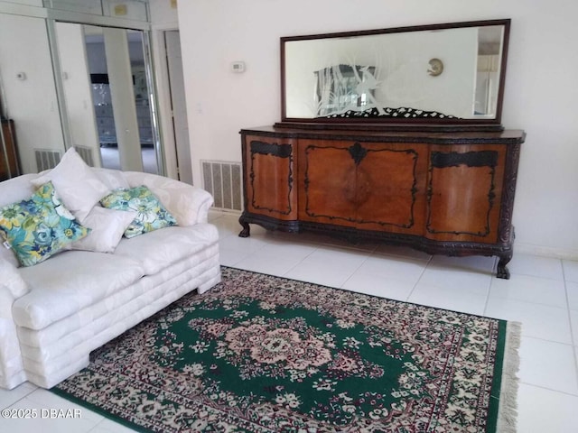 living room with light tile patterned floors