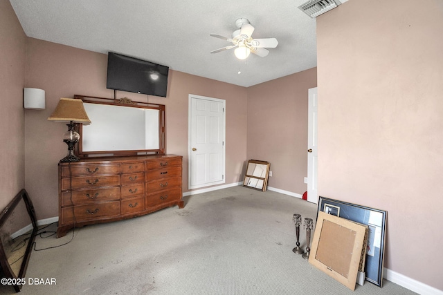 bedroom featuring ceiling fan and carpet floors