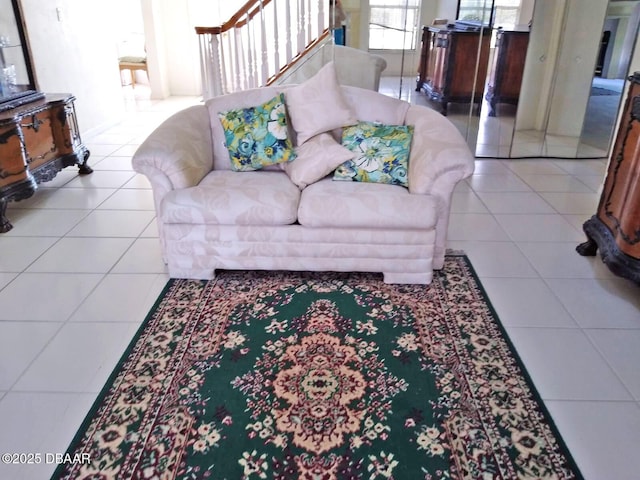 living room with light tile patterned floors