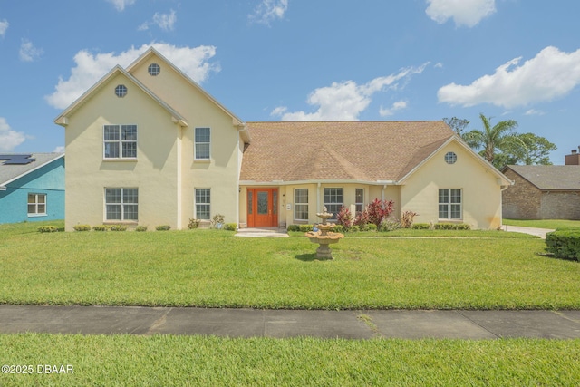 160 Big Ben Dr, Daytona Beach, FL 32117 - view of front of house with stucco siding and a front lawn