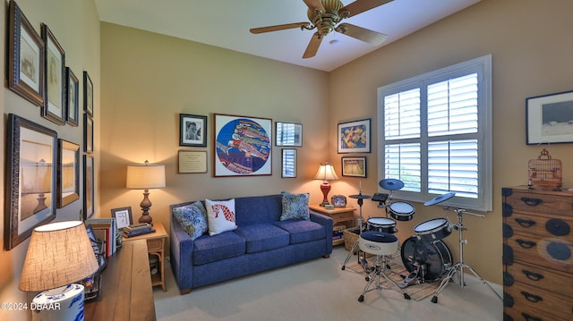 living room with carpet flooring and ceiling fan