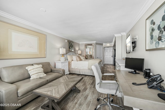 bedroom featuring hardwood / wood-style floors and ornamental molding