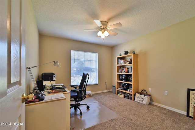 office with ceiling fan, a textured ceiling, and carpet