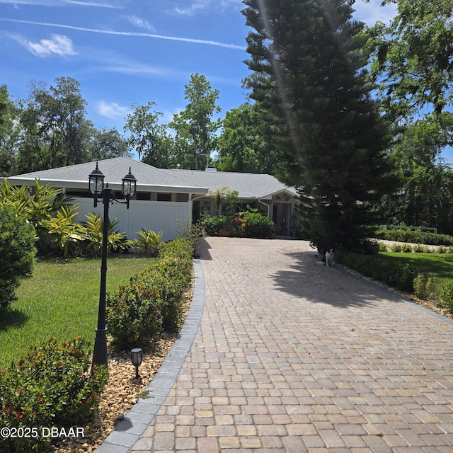1010 Bolton Rd, New Smyrna Beach, FL 32168 - view of front facade featuring decorative driveway