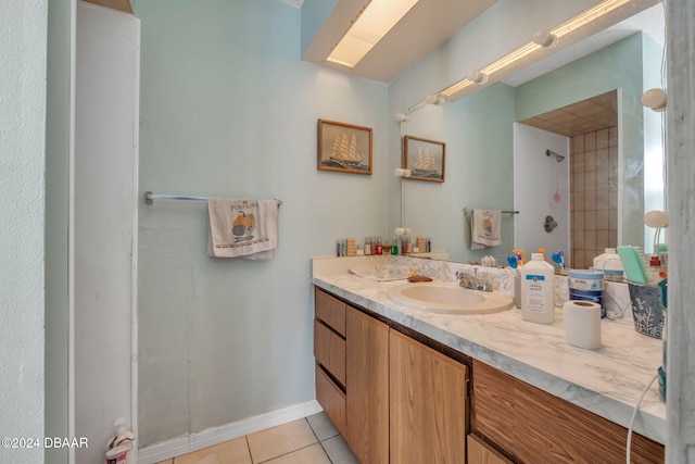 bathroom with vanity and tile patterned floors