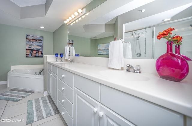 3311 S Atlantic Ave Unit 602, Daytona Beach Shores, FL 32118 - full bath featuring double vanity, tile patterned floors, a garden tub, baseboards, and a shower with shower door