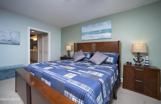3311 S Atlantic Ave Unit 602, Daytona Beach Shores, FL 32118 - carpeted bedroom featuring ensuite bathroom