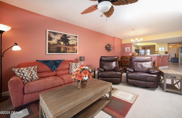 3311 S Atlantic Ave Unit 602, Daytona Beach Shores, FL 32118 - living area with a ceiling fan, a chandelier, and carpet flooring