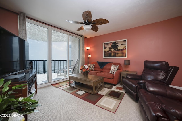 3311 S Atlantic Ave Unit 602, Daytona Beach Shores, FL 32118 - carpeted living room featuring ceiling fan
