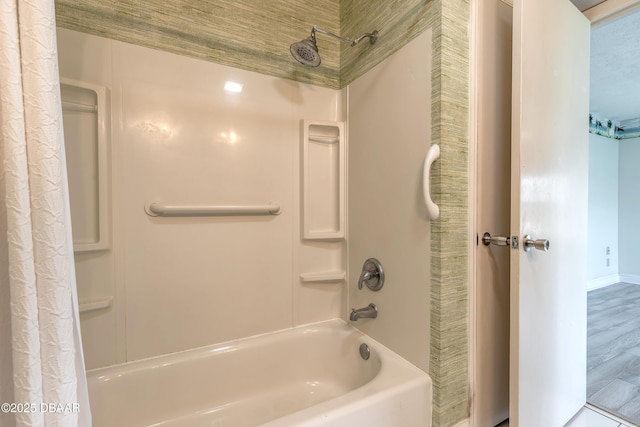 3622 Ocean Shore Blvd, Ormond Beach, FL 32176 - full bath featuring shower / tub combo and wood finished floors