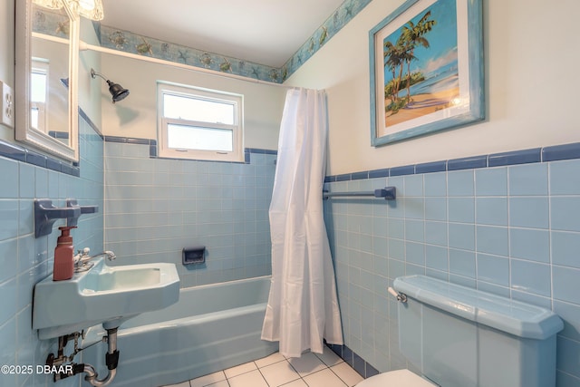 3622 Ocean Shore Blvd, Ormond Beach, FL 32176 - full bathroom with tile walls, shower / tub combo, tile patterned floors, and wainscoting