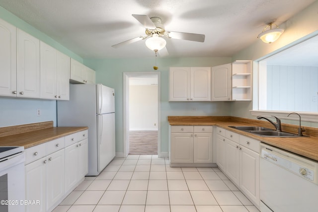 3622 Ocean Shore Blvd, Ormond Beach, FL 32176 - kitchen featuring white appliances, white cabinetry, a ceiling fan, open shelves, and light tile patterned flooring