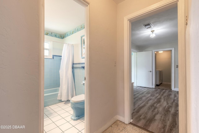 3622 Ocean Shore Blvd, Ormond Beach, FL 32176 - hallway featuring baseboards and tile walls