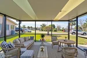37 Berkley Rd, Ormond Beach, FL 32176 - sunroom with outdoor lounge area and plenty of natural light