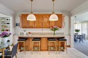 37 Berkley Rd, Ormond Beach, FL 32176 - bar area featuring pendant lighting