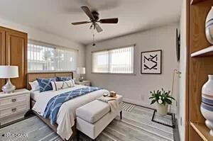 37 Berkley Rd, Ormond Beach, FL 32176 - bedroom featuring wood finished floors and ceiling fan