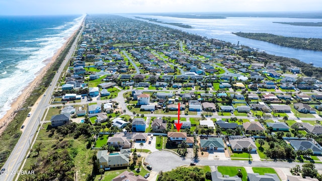 aerial view featuring a beach view and a water view