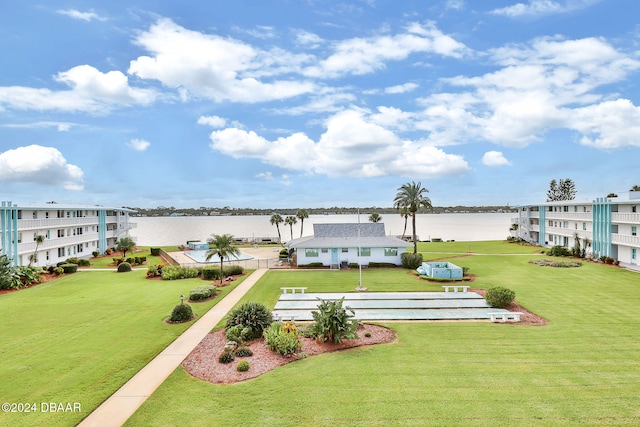 exterior space with a water view