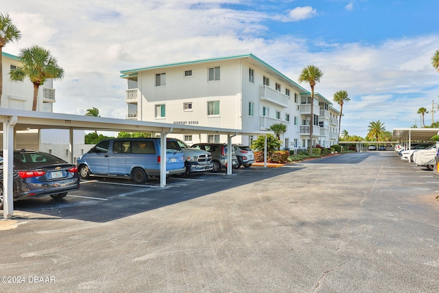 view of parking featuring a carport