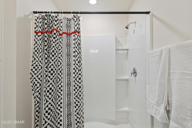 bathroom with a shower with curtain