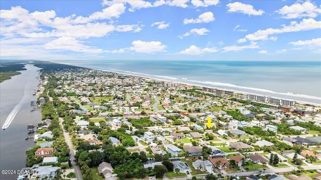 aerial view with a beach view and a water view