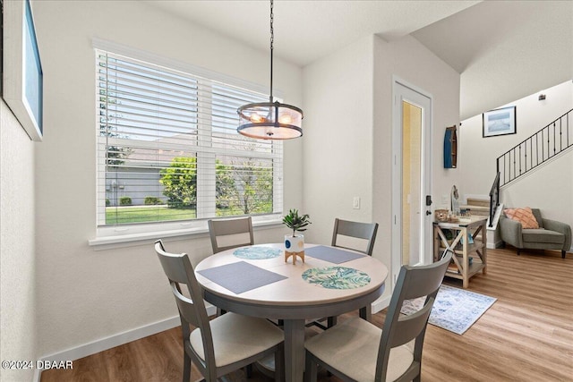 dining area featuring light wood-type flooring