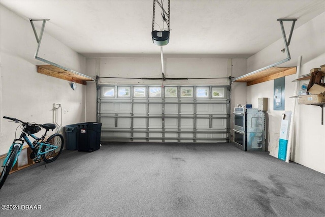 garage with electric panel and a garage door opener