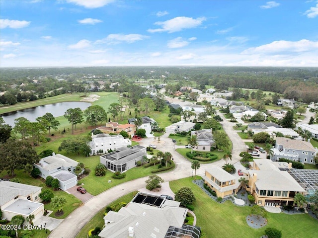 bird's eye view with a water view