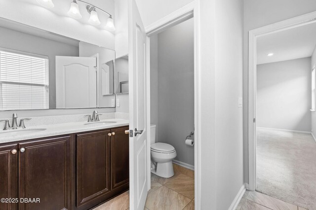 115 Pergola Pl, Ormond Beach, FL 32174 - bathroom featuring double vanity and toilet